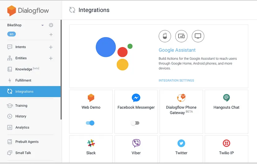 Google AssistantおよびFacebook Messenger、Slack、Twitterなどの様々なメッセージングプラットフォームオプションを表示する「統合」セクションを示すDialogflowインターフェース。